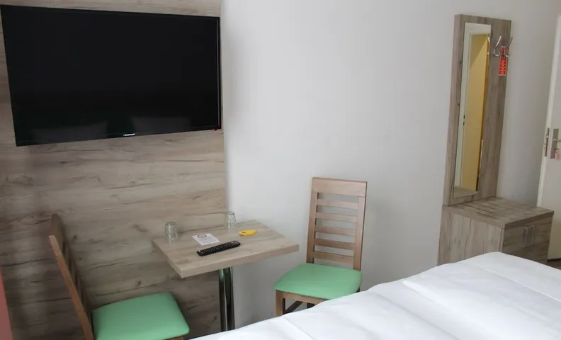 호텔 펜지온 쾨베를