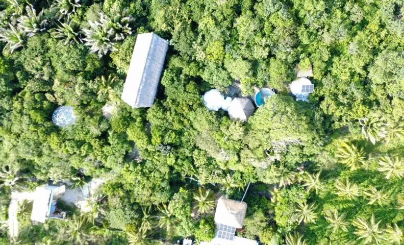 New Ruins Off-The-Grid SuperAdobe Domes with Pool