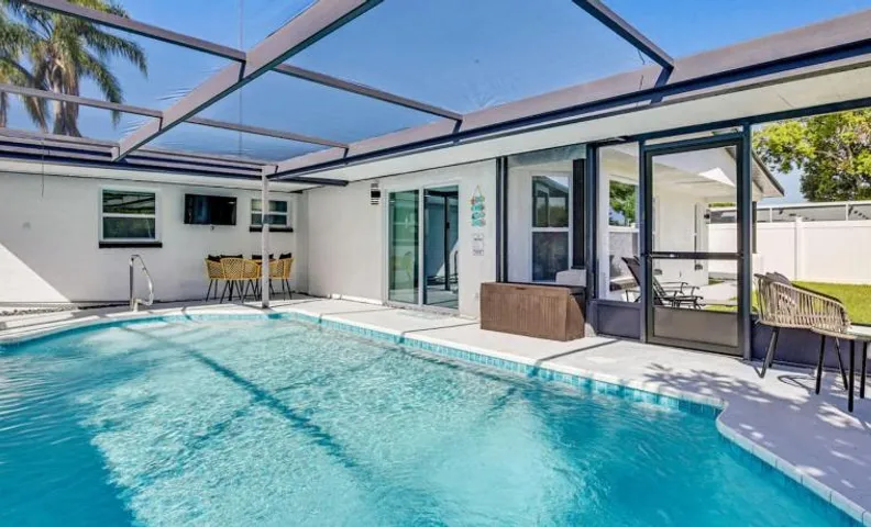 Canal Front Getaway Poolside Relaxation Fishing