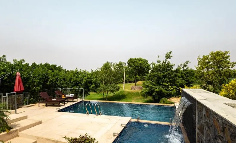 ELIVAAS Signature Stone Age Home Fernwood 6-BHK Stone-Clad Estate with Bamboo Cottages, Private Pool
