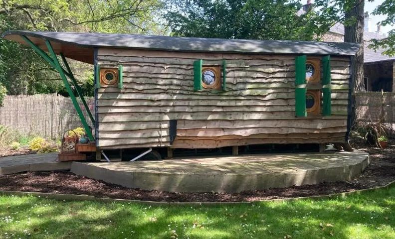 The Owl House in countryside setting