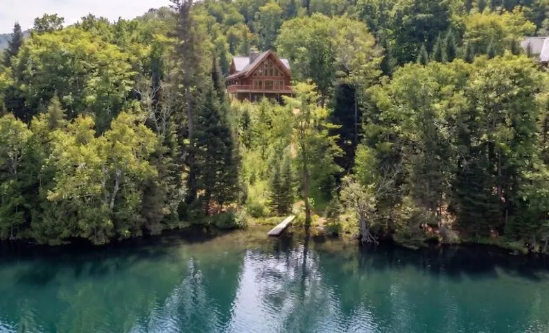 Chalet Rougeaud Cozy Waterfront Chalet with Hot Tub and Fire Pit
