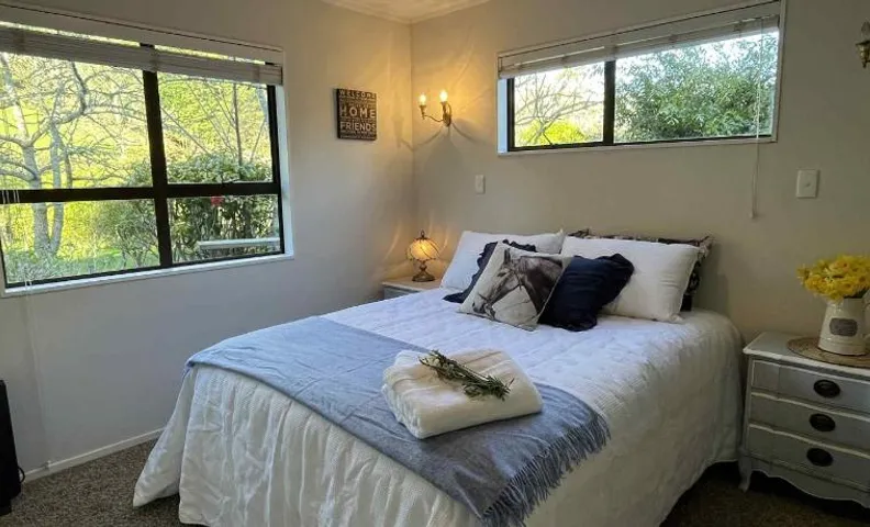 Rose Cottage - private suite - bedroom, lounge, bathroom and kitchenette