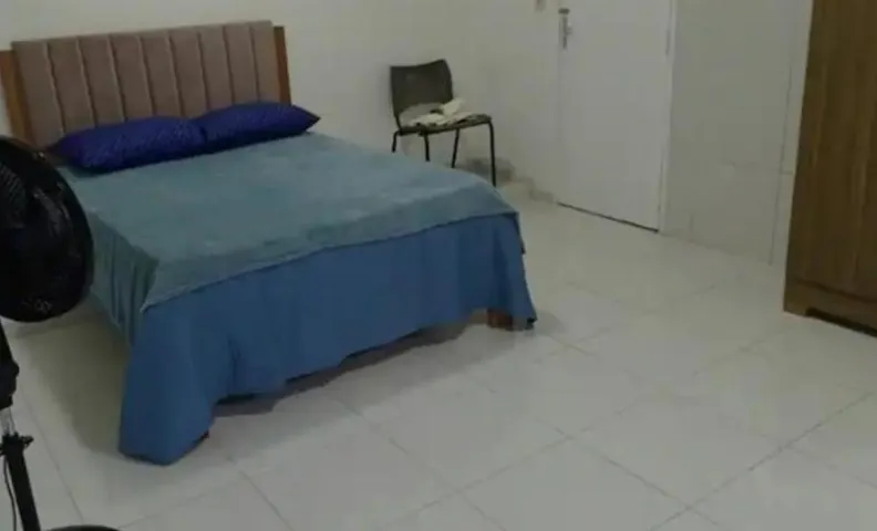 Suíte com ar condicionado e garagem
