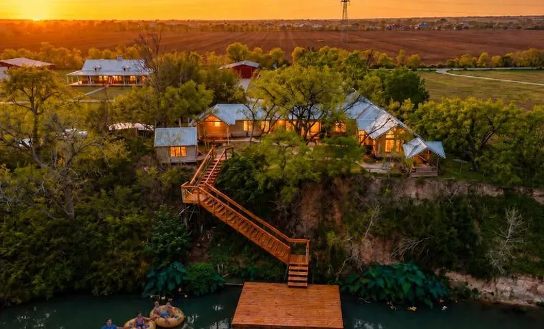 Private Riverfront Estate with Dock, Pool, Hot Tub, and Gym
