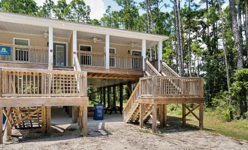 Inviting home near the beach with balcony full kitchen central AC & W&D