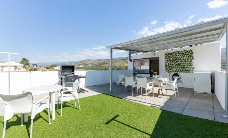 La Casa de la Buhardilla