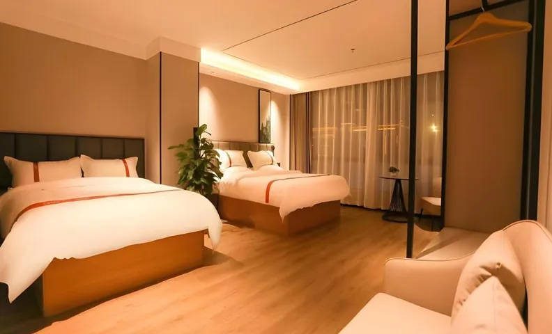 Shell Hotel Zhoukoushi Xihua County Chuangshi Wenhua Plaza
